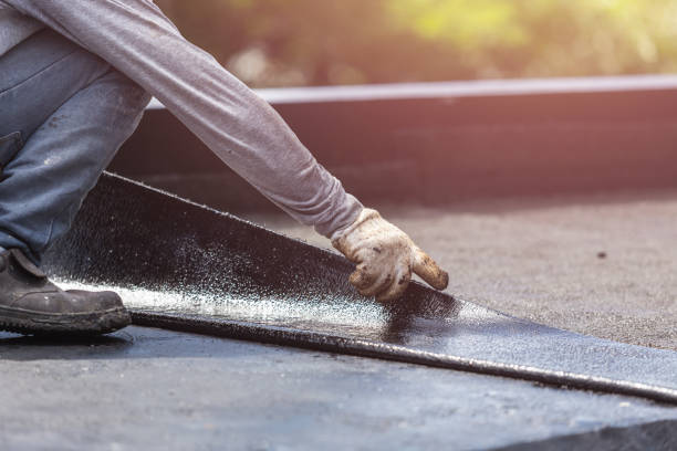 Professional Waterproofing technician working in Burlington, IN